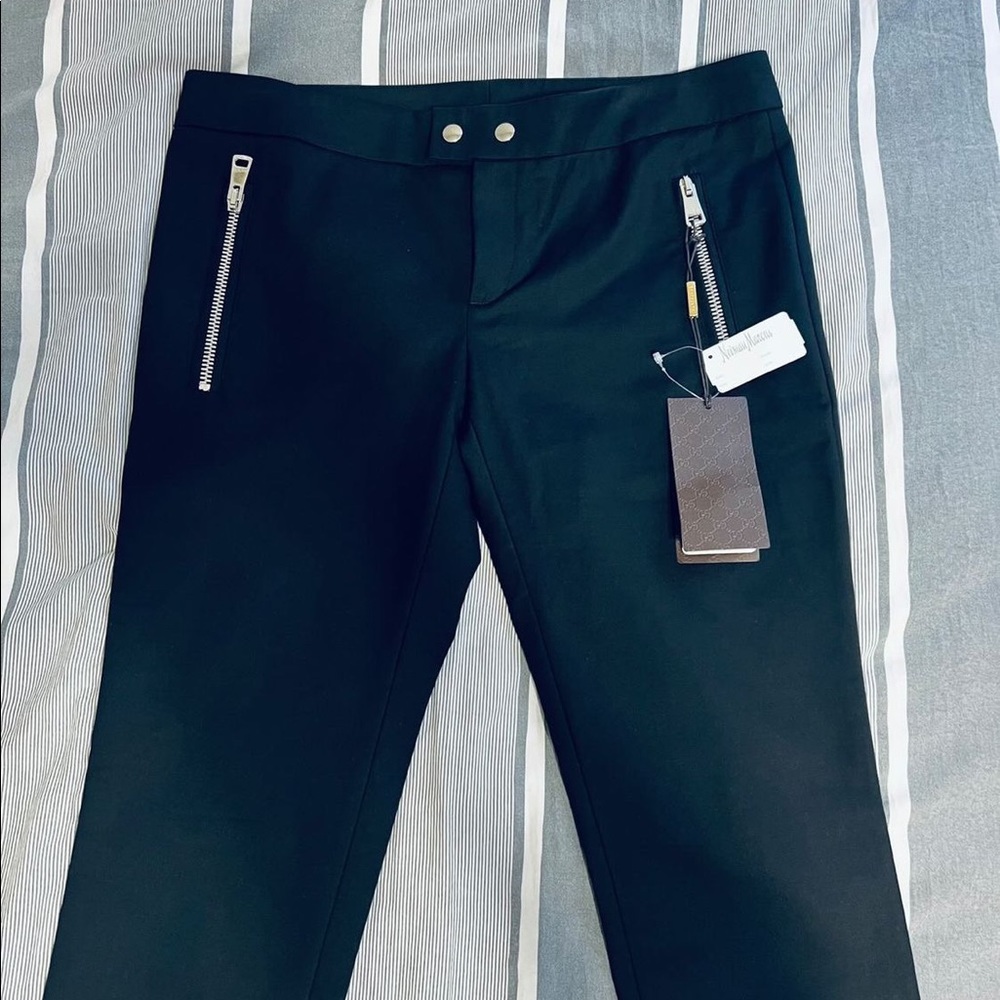 Gucci black woman pants with zipper on front pockets and on the legs size 8
